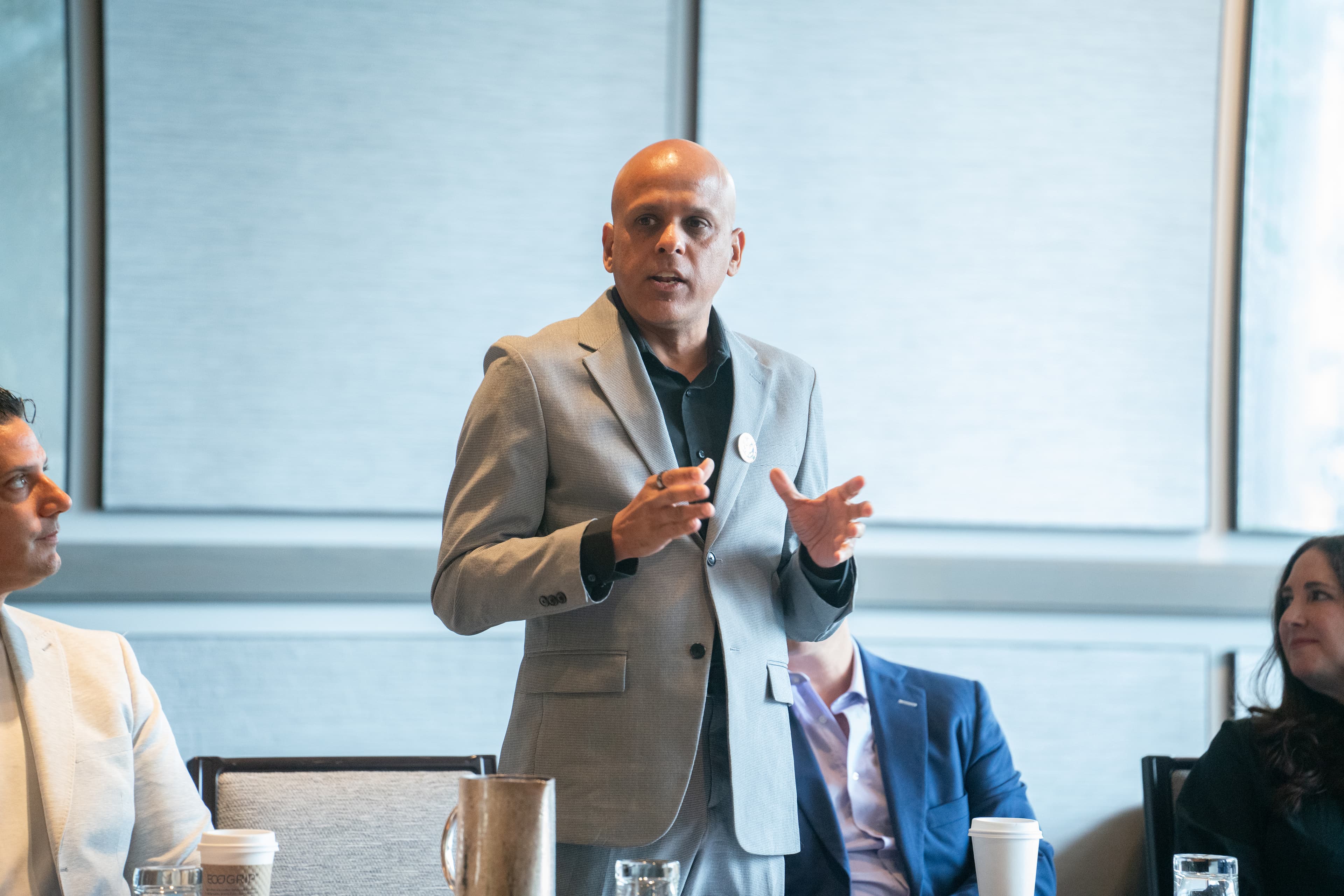 Manuj Aggarwal speaking to a group of founders